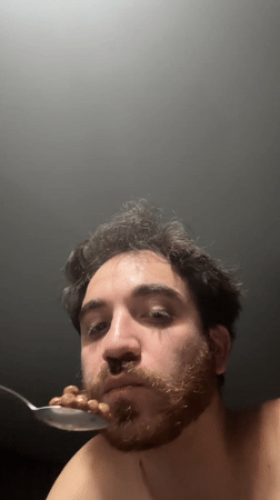 Man eats baked beans in Santa Clara Ocoyucan