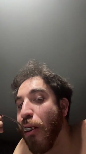 Man eats baked beans in Santa Clara Ocoyucan
