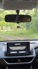 Driver in Gerokgak encounters Indonesian warning on car touchscreen