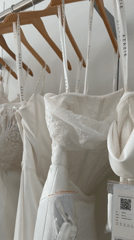 Wedding dresses displayed on rack captured in Los Angeles