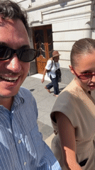 Smiling outside Victoria Palace Theatre, Westminster