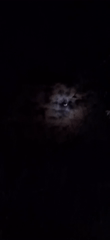 Crescent moon observed through clouds over Vallecito, Venezuela