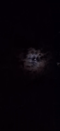 Crescent moon observed through clouds over Vallecito, Venezuela