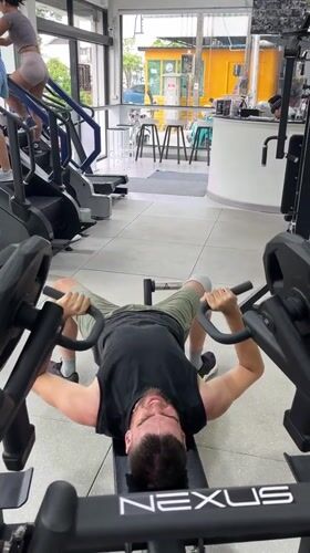 Gym workout on weight machines in Chiang Mai