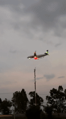 Low-flying illuminated passenger plane spotted over Huejotzingo, Mexico