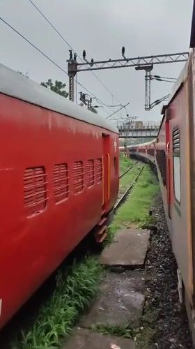 Relief medical train rolls through Bhopal amid roadside scene