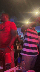 Late-night outdoor party with live music in Guzape, Nigeria