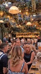 Evening social gathering at eclectic Cardiff bar with live music