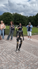 Gold-accented humanoid robot dances in Saint Petersburg park