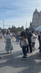 Amsterdam weekend afternoon: street performers, ice cream, shopping observed