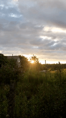 Dusk settles over a quiet rural village in Ukraine