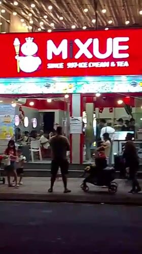 Evening street life documented in Bac Nha Trang Ward, Vietnam