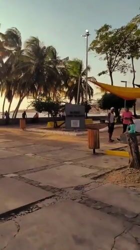 Evening sunset gathering at Juan Griego waterfront plaza