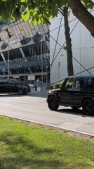 Sunny Moscow street scene with modern architecture captured