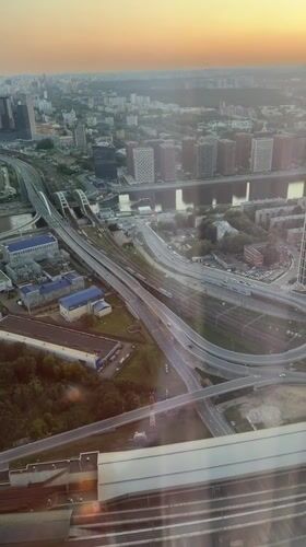 Sunset over Khimki, from highway interchange to living room plants