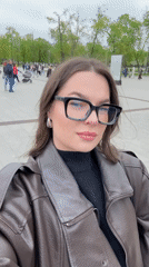 Woman takes selfie video in Moscow public square