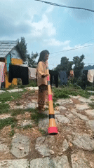 Morning practice with instrument and staff in a Himalayan village