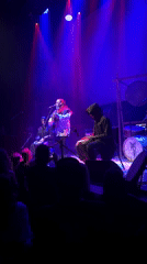 Late-night live music performance on a Toronto stage