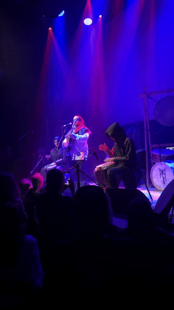 Late-night live music performance on a Toronto stage