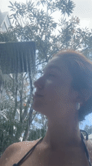 Woman enjoys early morning leisure time at Thailand resort