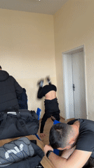 Man performs handstand in dormitory room in Varna