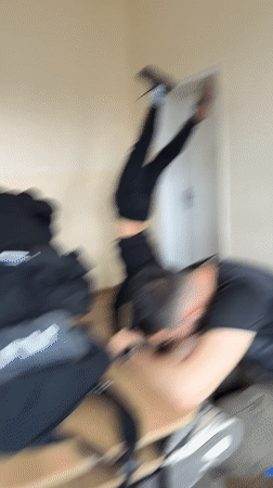 Man performs handstand in dormitory room in Varna