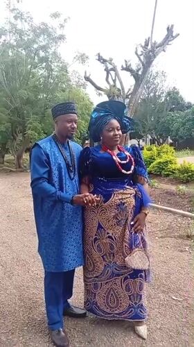 Traditional blue attire and celebration in Tambes Mile Four, Nigeria