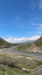 Morning traffic flows through scenic Armenian mountain roads