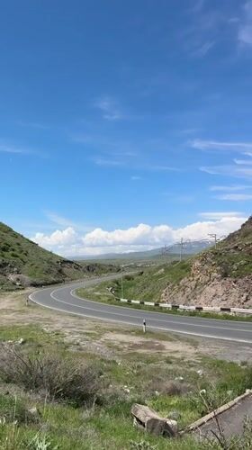Morning traffic flows through scenic Armenian mountain roads