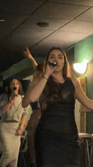 Woman performs in sequined dress at Varna bar