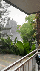 Morning rain shower documented from North Kuta balcony