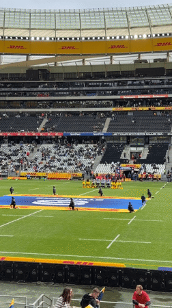 Rugby match observed at Cape Town stadium during overcast afternoon