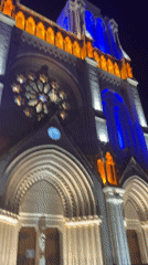 Notre-Dame de Nice basilica illuminated in colorful nighttime display