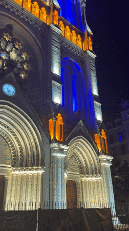 Notre-Dame de Nice basilica illuminated in colorful nighttime display