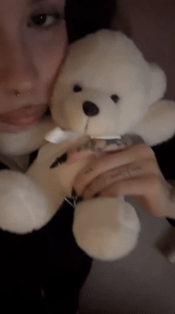 Late-night Buenos Aires: makeup, a teddy bear, and mirror selfies
