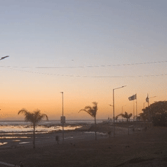 Sunset documented along Río de la Plata waterfront in Argentina