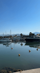 Woman captures scenic morning moments at Fethiye marina, Turkey