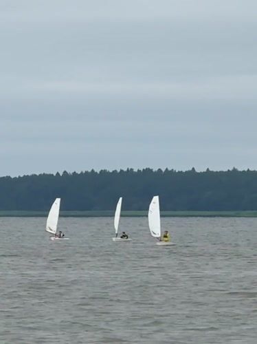 Sailboats on Votkinsk Reservoir, waterfront scenes, local life