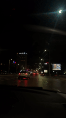 Evening scenes documented across Sofia's wet city streets