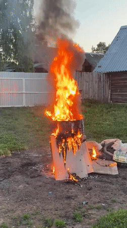 Lawn mowing and backyard fire documented in Rusalevka
