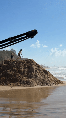 Tel Aviv beachgoers enjoy sunny afternoon activities