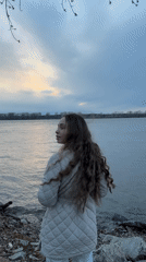 Riverside photography session documented in Chaikovsky, Russia