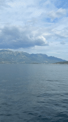 Coastal scenes and blooming bougainvillea captured in Đenovići, Montenegro