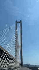 Crossing a cable-stayed bridge in sunny Kyiv