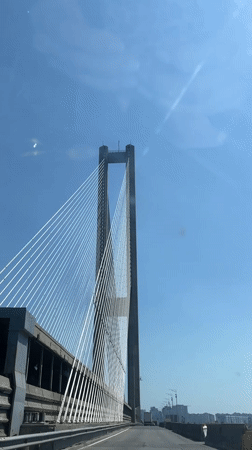 Crossing a cable-stayed bridge in sunny Kyiv