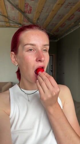 Casual home hangout with strawberries and a dog in Chaikovsky