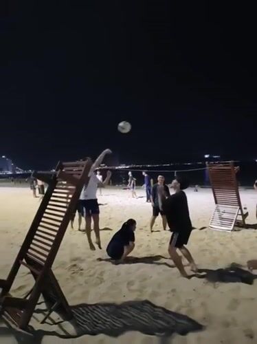 Evening beach volleyball and street life in Nha Trang