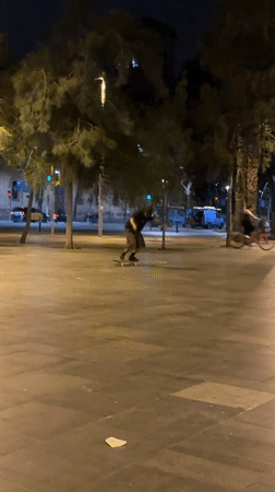 Skateboarder's evening journey through Barcelona parks restaurants and transit