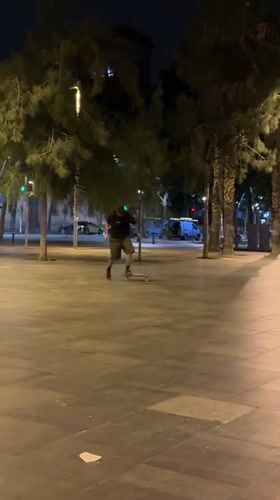 Skateboarder's evening journey through Barcelona parks restaurants and transit