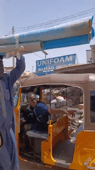 Street scene captured from vehicle in Badiko, Nigeria